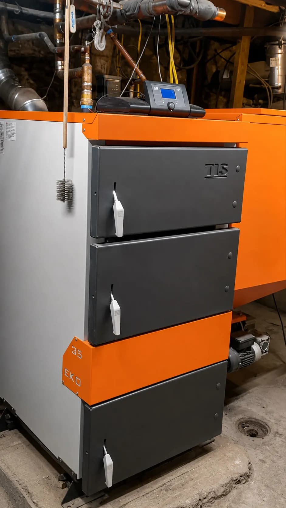 Side view of an EKO Duo boiler with closed access doors and digital controller in a mechanical room.